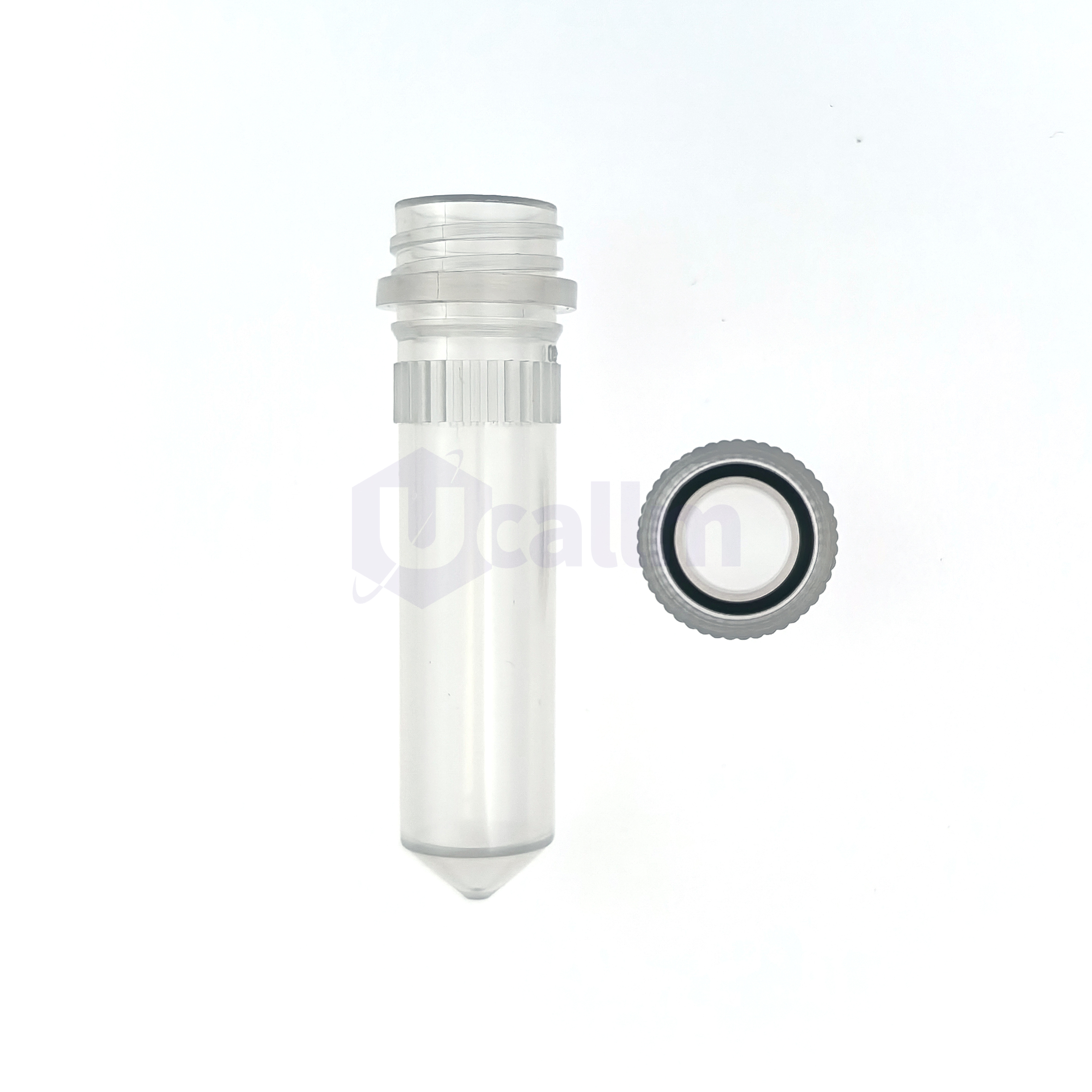 D1061-04 (2) Close-up of a clear syringe with plunger, barrel visible against a white background, tip pointing downward
