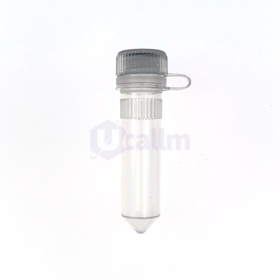 Close-up of a clear glass dropper bottle with a ribbed gray cap, viewed from the side.