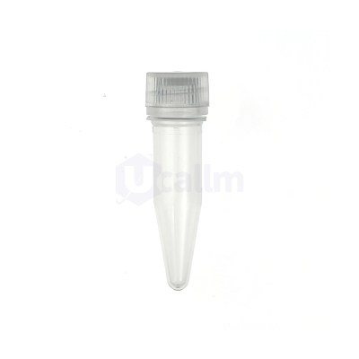 Close-up of a clear plastic bottle cap with ridged edges on a white background