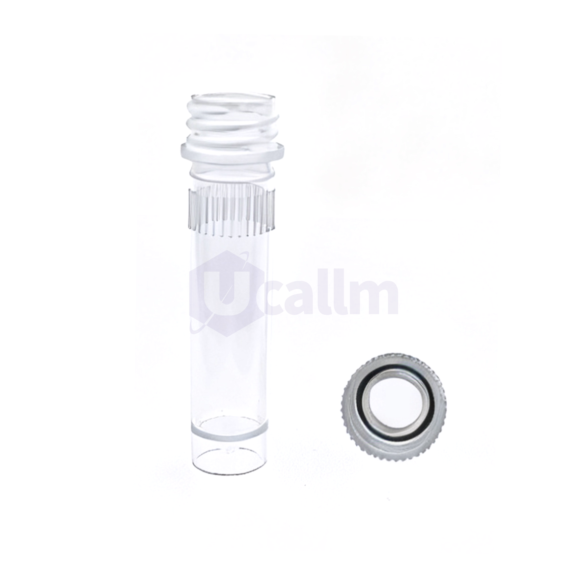 P1061-05(3) Close-up of a transparent syringe neck with threading beside a metal ball bearing on a white background.