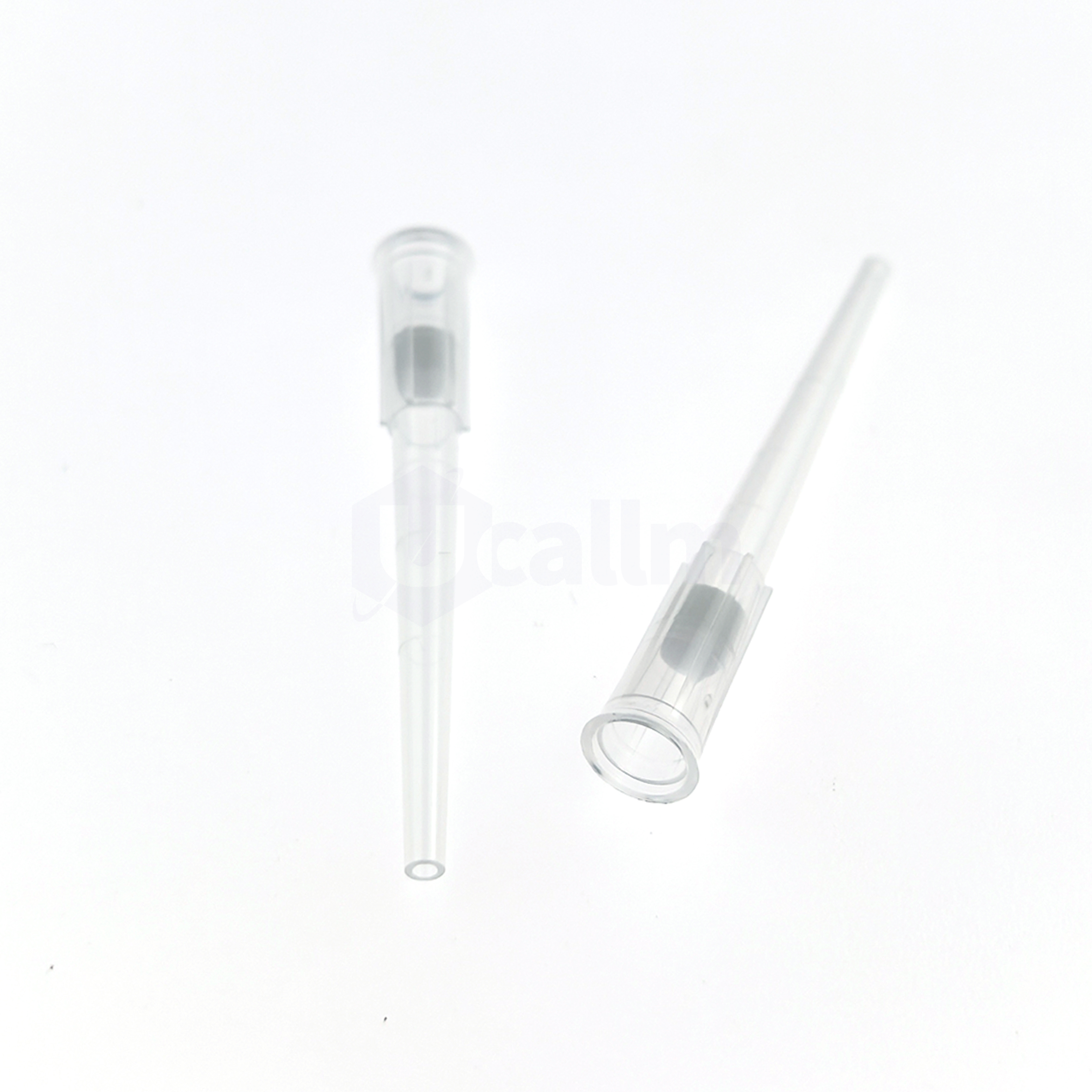 200µL Low Retention Wide-bore Filter Pipette Tips, Clear, Filtered, Non-sterile, Bagged-3 Close-up of a clear syringe with a needle cap removed and tubing, on a white background.