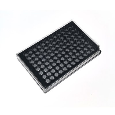 Black plastic 96-well microtiter plate inside a clear lid, viewed at an angle on white background.