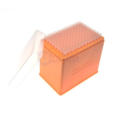Orange lab storage box holding a grid of clear microcentrifuge tubes with pink caps, viewed from a tilted angle, in a white background setting.