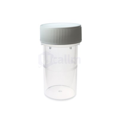 Close-up of a white ribbed plastic bottle cap on a clear bottle, taken from the side edge.